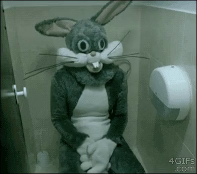 Someone wearing a nightmarishly poor quality Bugs Bunny mascot costume sits on a toilet, scoots themself over, pats the seat invitingly, and patiently waits for you to join them